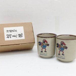 Vintage Set of 2 Asian Weightlifting Tea Cups Boxed Pelican Or Buzzard